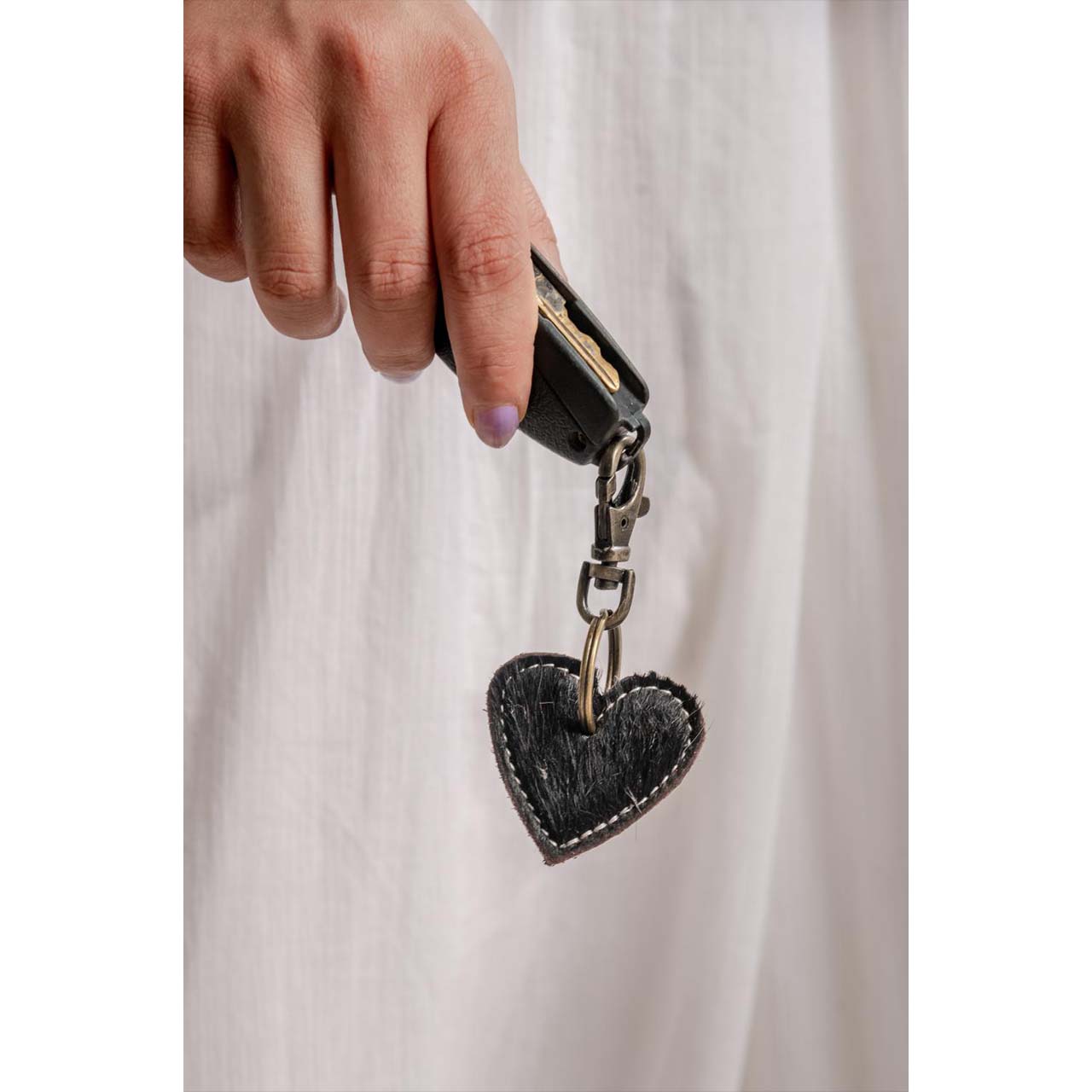 1002-1.jpg Manifet Keychain - Image 1