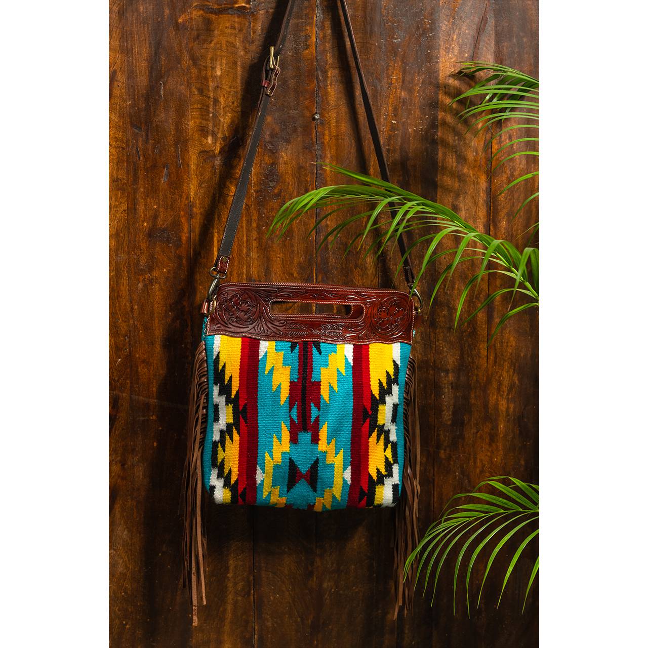 14024-1.jpg Cowhide Tooling Carving Fringe Bag - Image 1