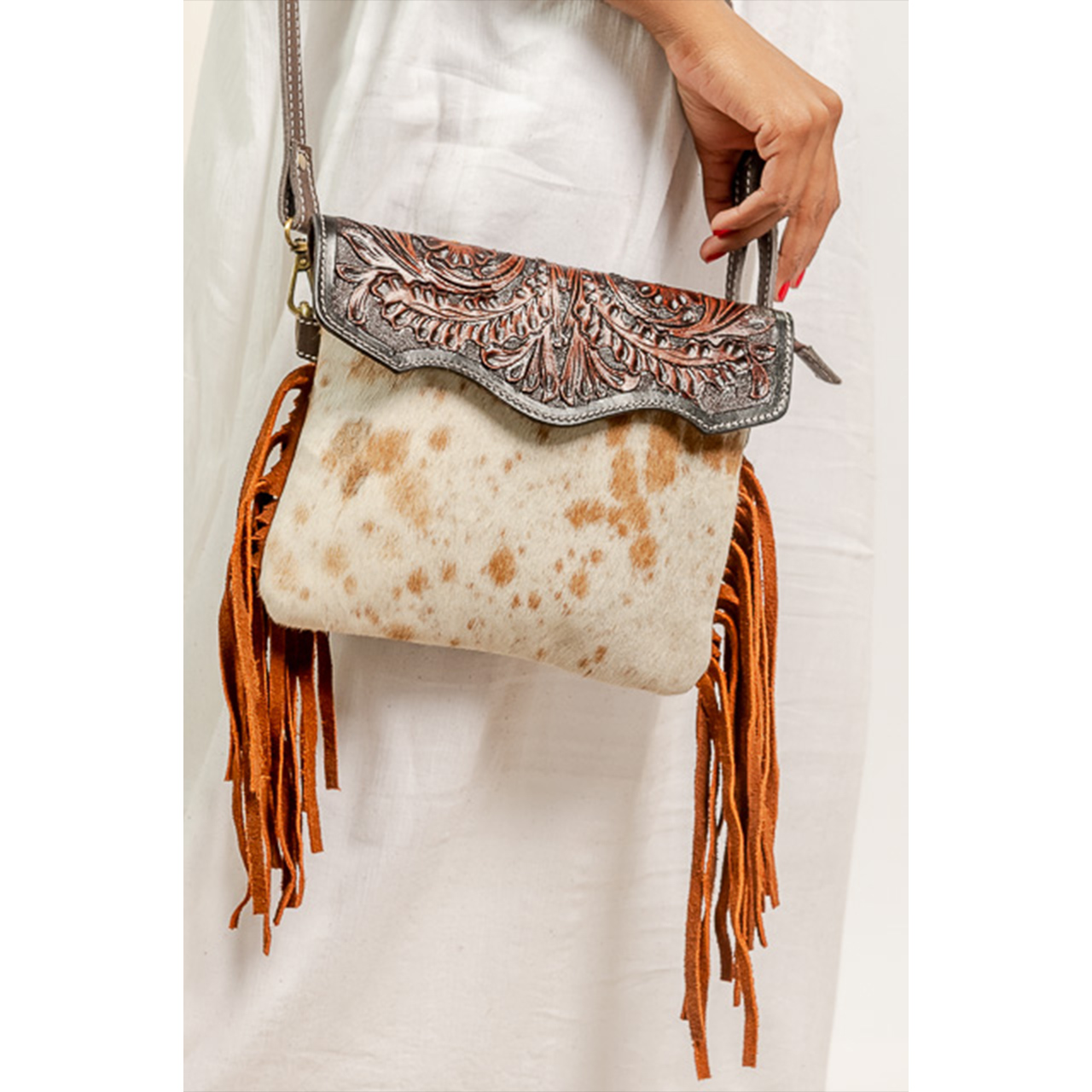 14132-1-1.jpg Cowhide Tooling Carving Fringe Bag - Image 1