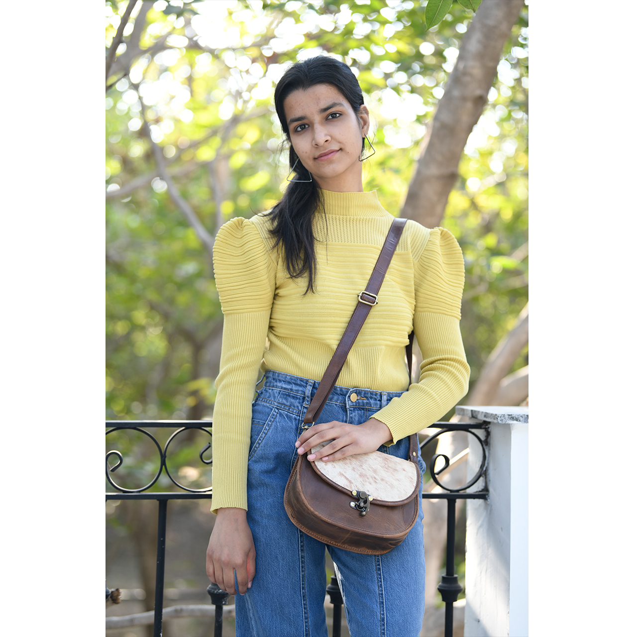 19015-2.jpg Lock Cowhide Sling Bag - Image 1