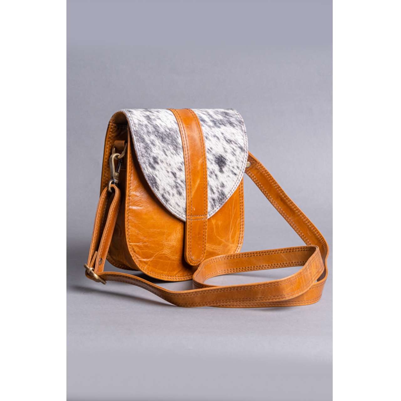 19016-1.jpg Cowhide Sling Bag - Image 1