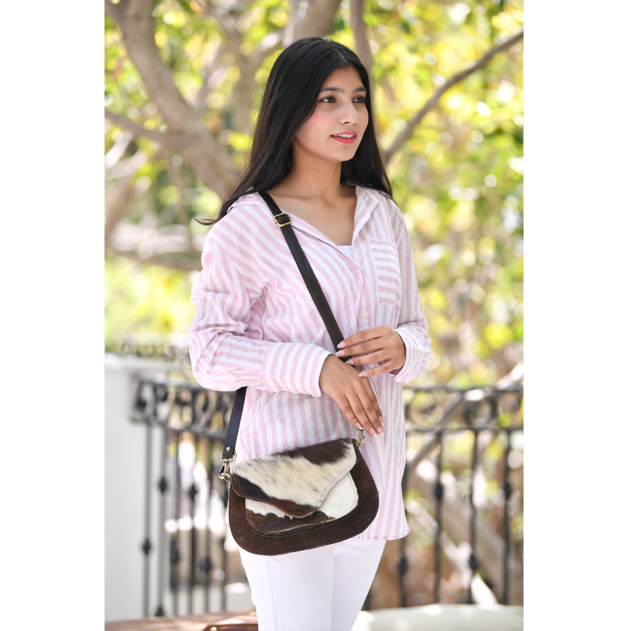 19018-1.jpg Weekend Cowhide Sling Bag - Image 1