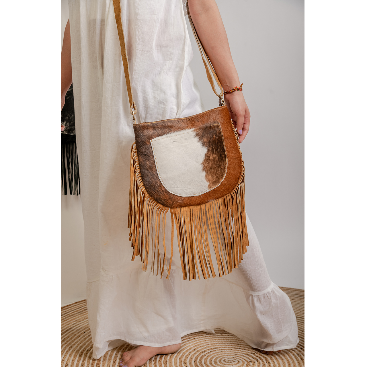 19038-2.jpg Branded Cowhide Fringe Bag - Image 1