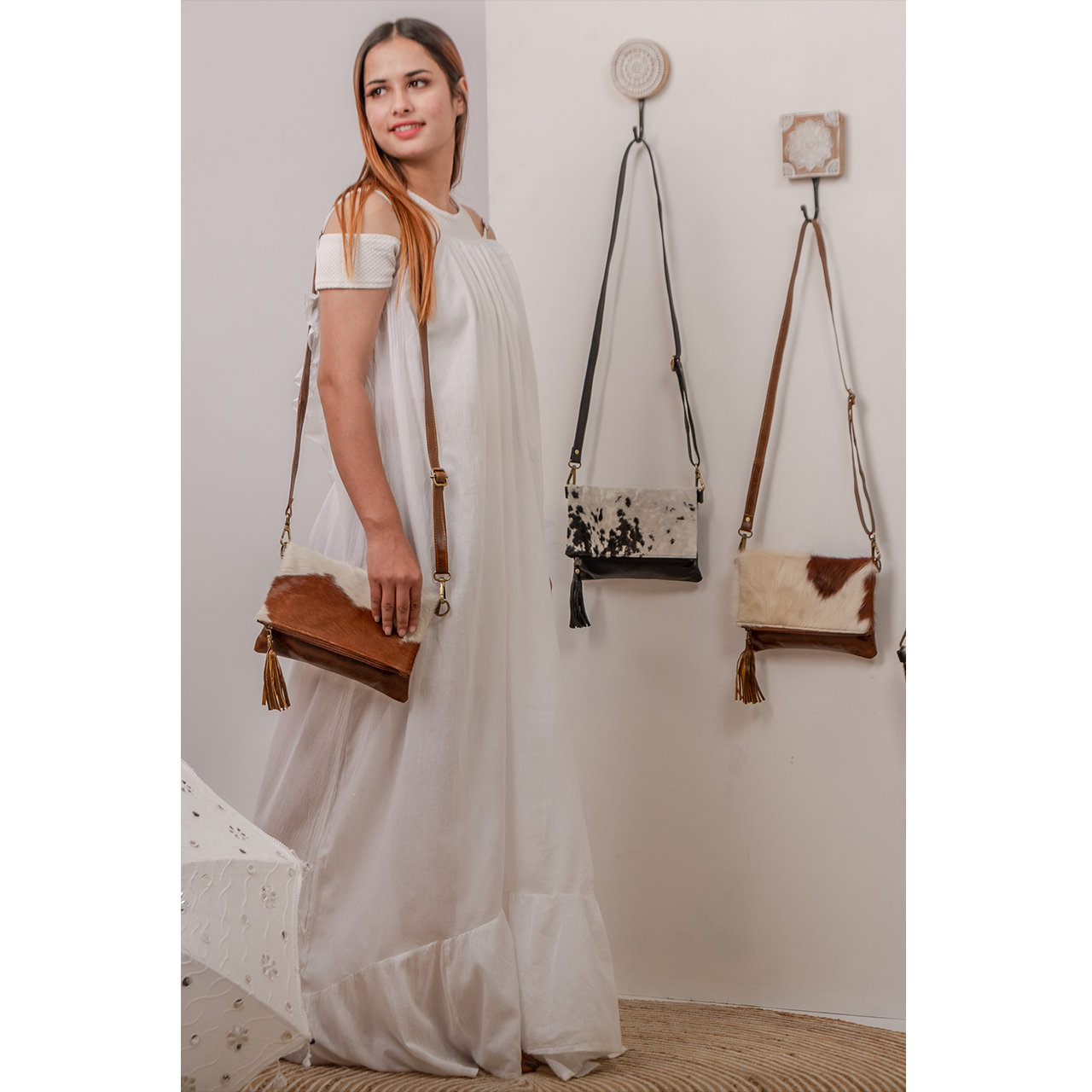 19065-1.jpg Maii Cowhide Sling Bag - Image 1